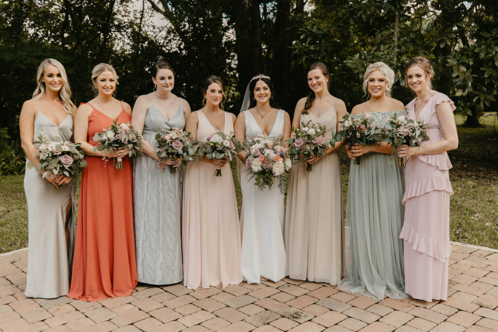 mismatched pastel bridesmaids dresses