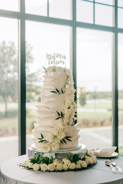 white ruffled wedding cake