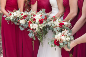 red bridesmaids bouquets