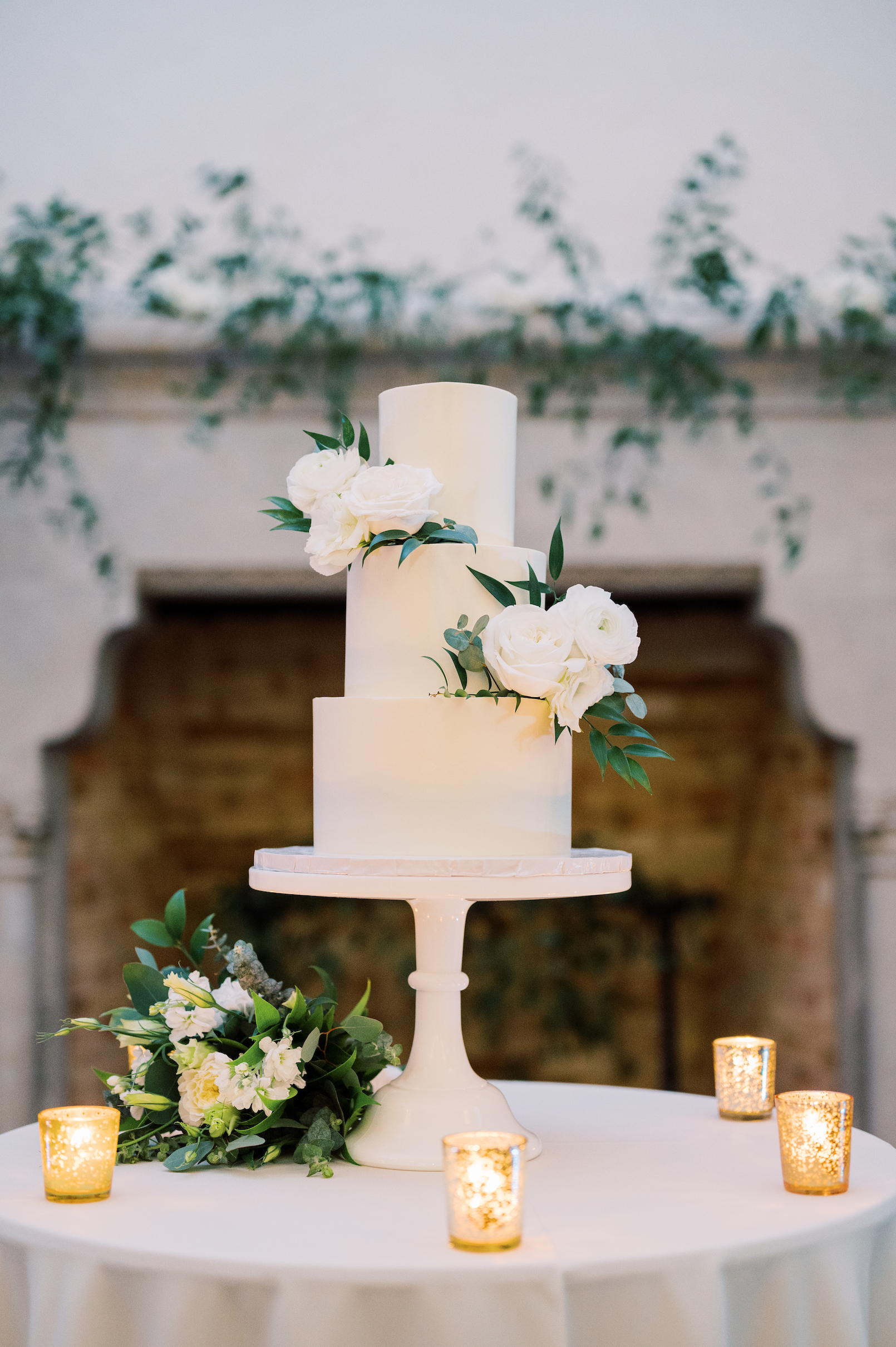 white greenery wedding cake